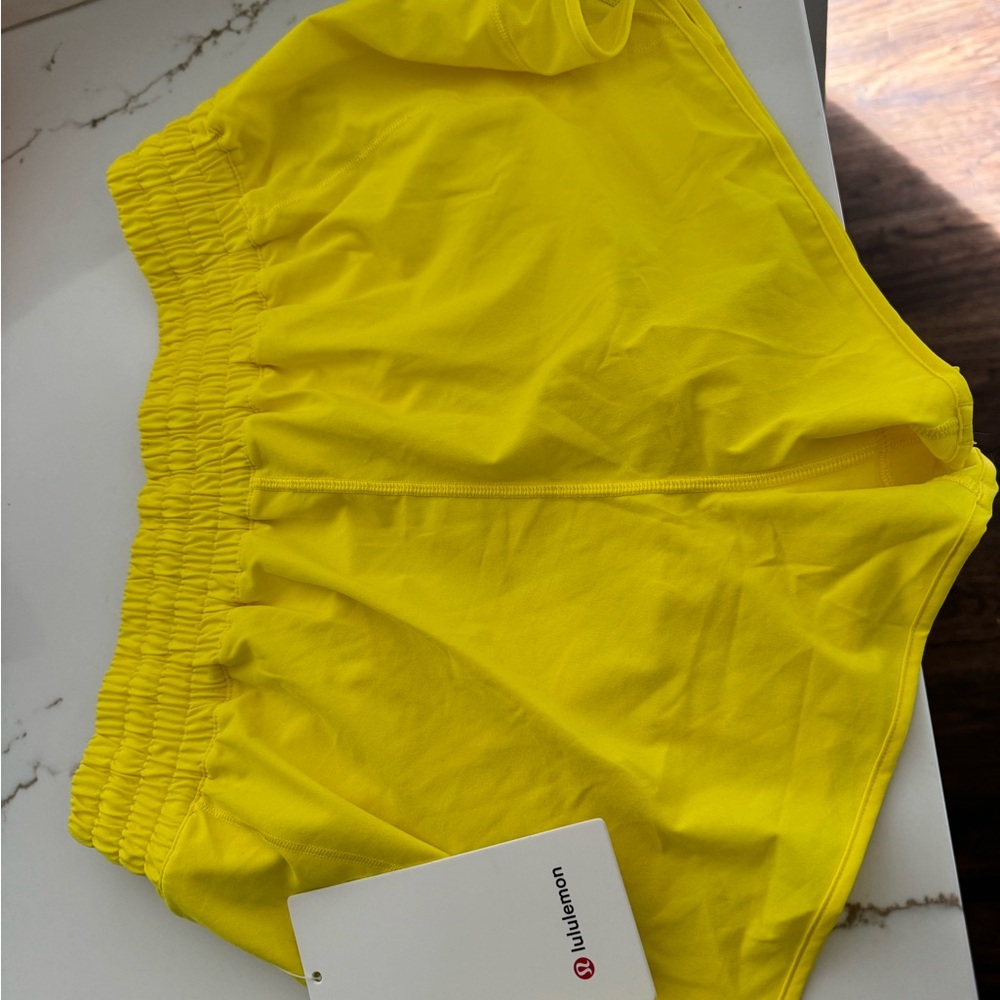 Size 10 Yellow Hotty Hot new with tags Lulu Lemon shorts